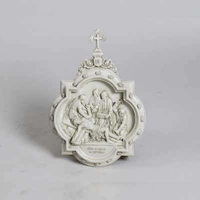 Station of the Cross Wall Sculpture: Jesus Is Nailed To Cross